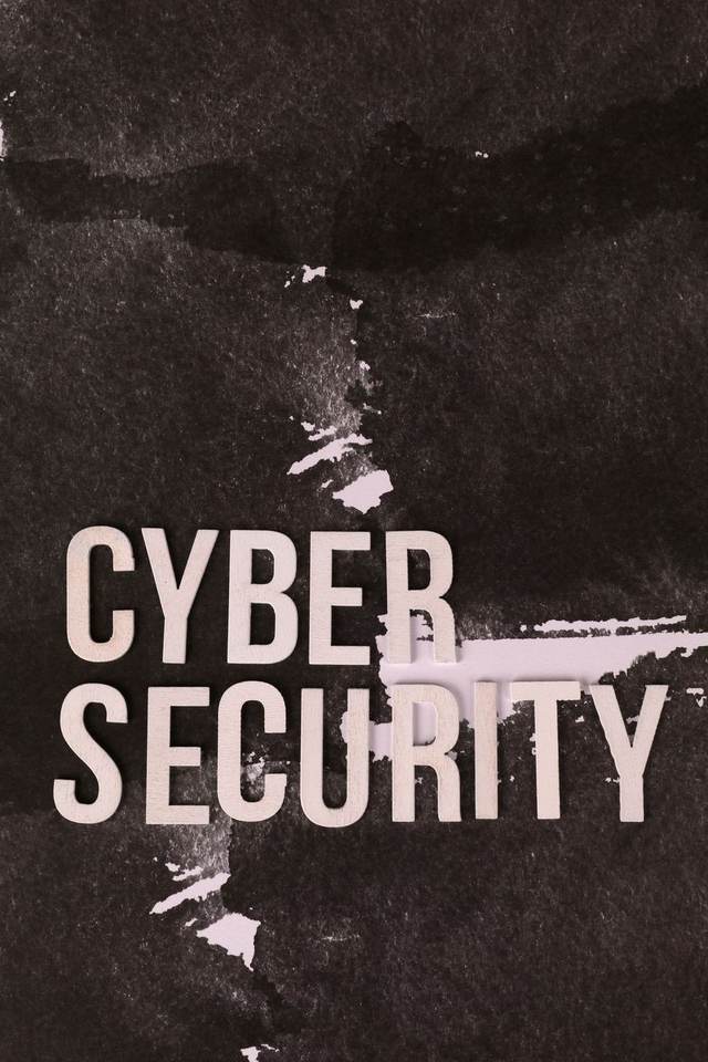 The words cyber security on a wall